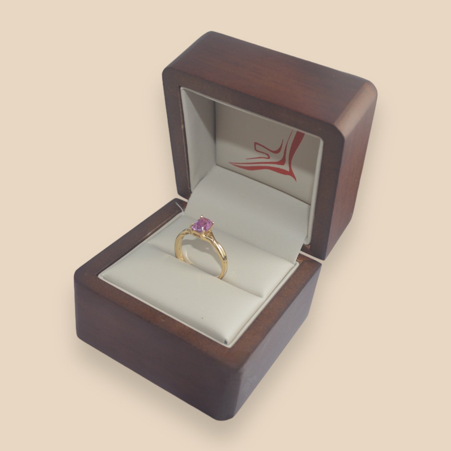 Anillo de zafiro rosa en oro de 18 kilates